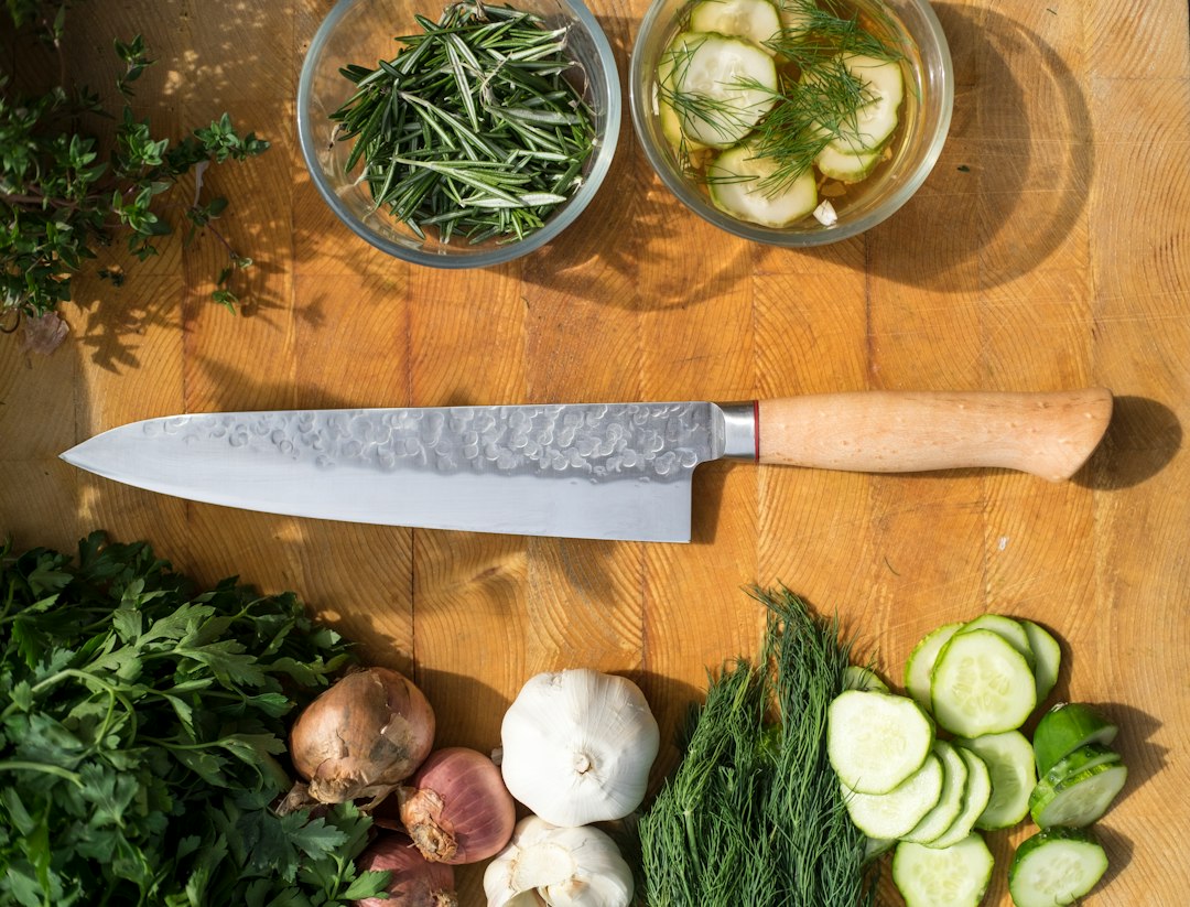 sliced vegetables and meat on chopping board